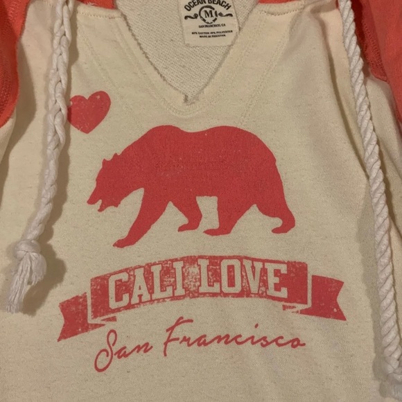 A pink and white sweatshirt. Cali Love/ San Fran - Picture 3 of 4